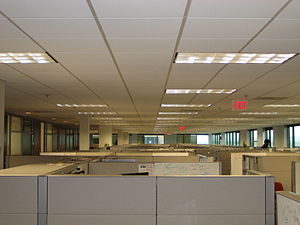 An image of a lot of cubicles that seem to go ...